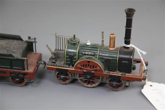 A Marklin electric locomotive and tender, The Fury, loco 5.5in. tender 3.75in. carriages 5.5in.